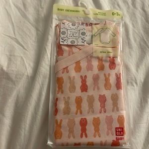 Uniqlo Baby onesie long sleeve 0-3 months. New